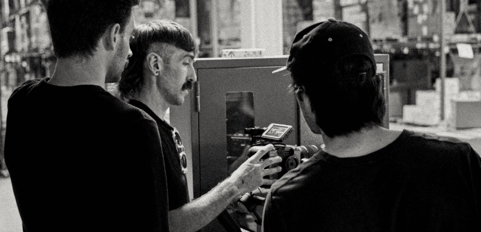 Style Driven team reviewing footage at a creative workspace