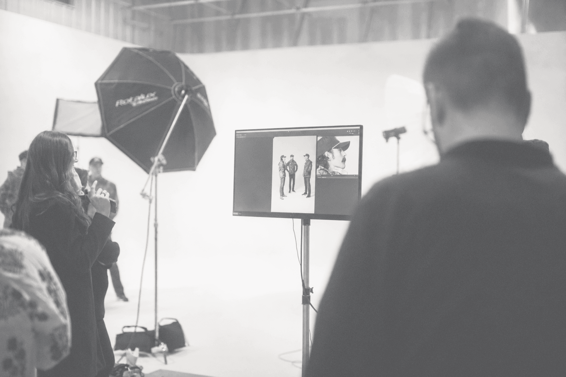 Style Driven team reviewing shots on set